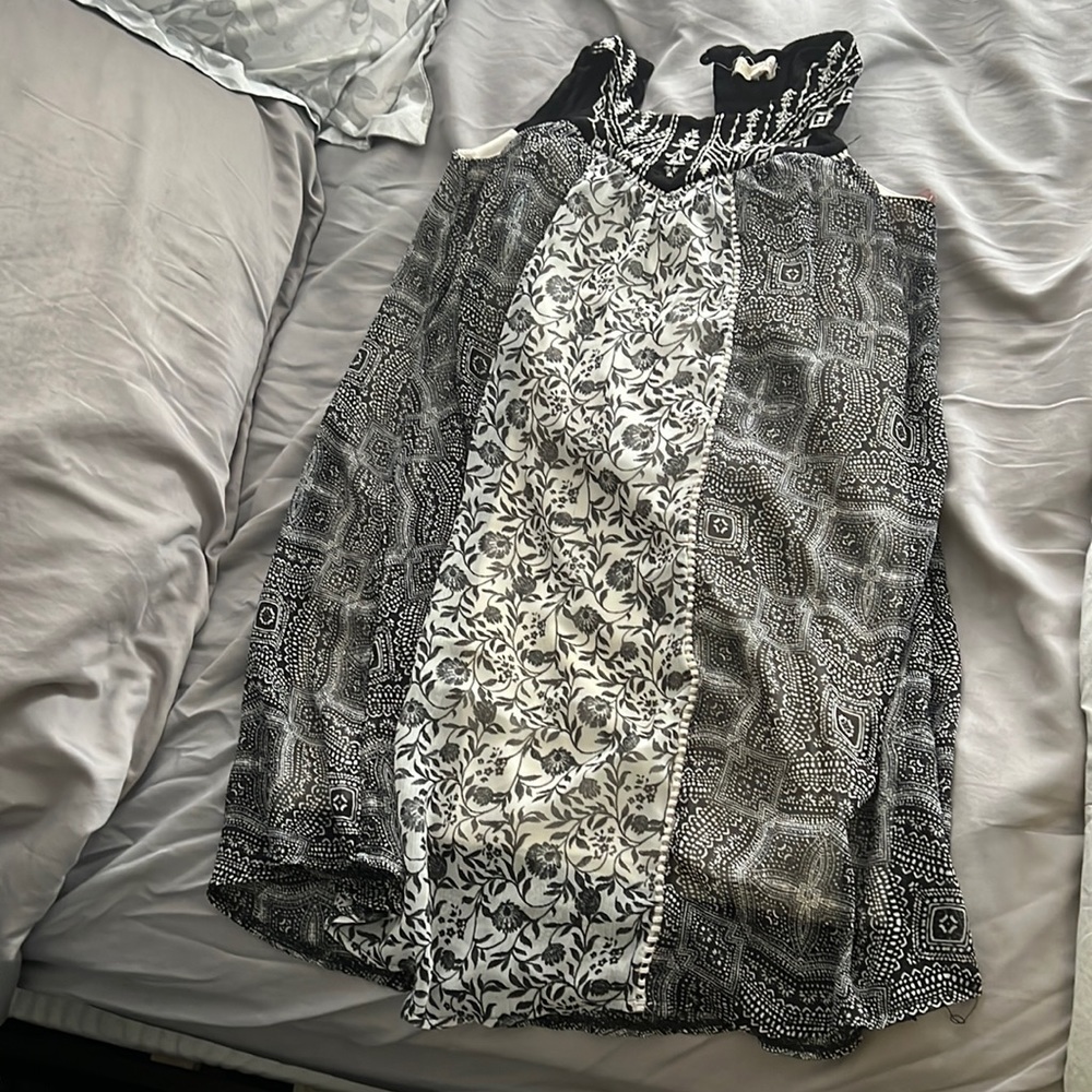 Flowy and cute. Can be worn as a dress or top